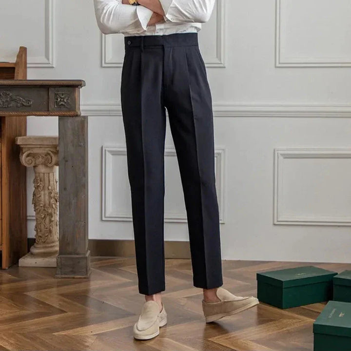 Close-up of the hem of men's straight leg dress pants, showing the clean and finished edge