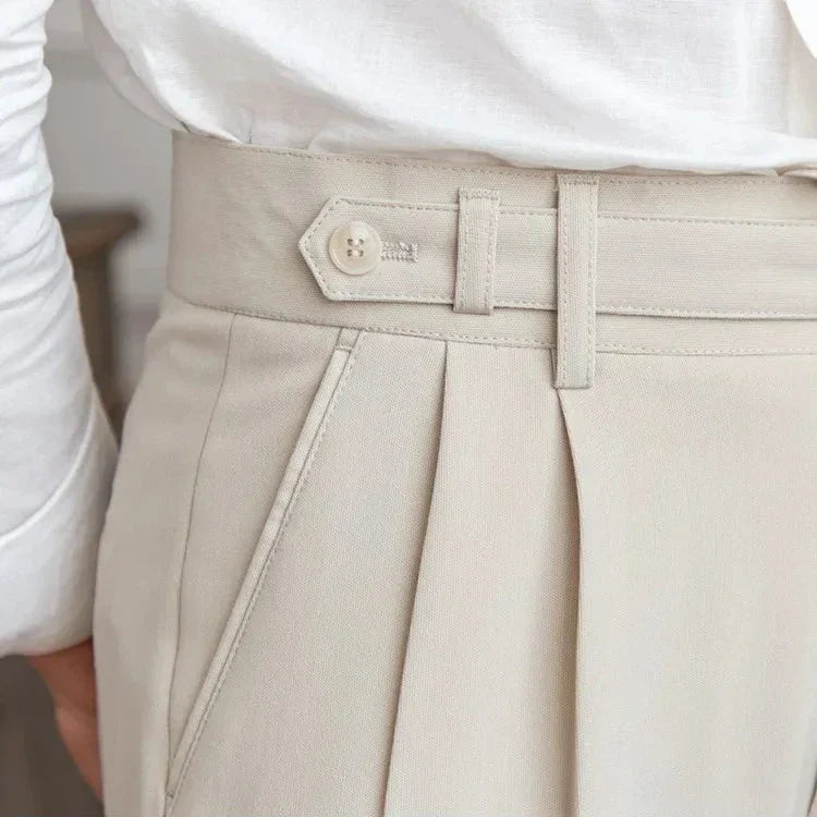 Men's straight leg dress pants displayed with a range of shirt options for different formal looks