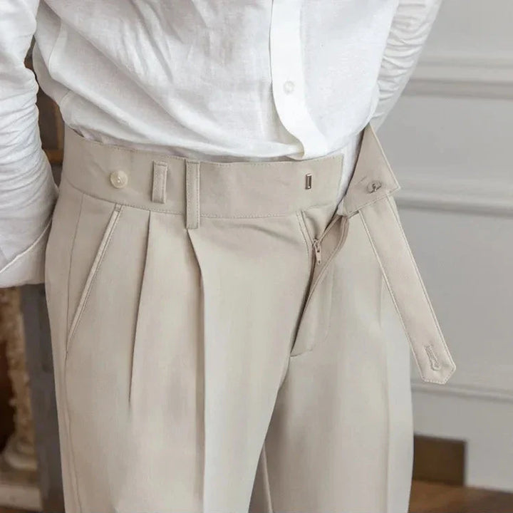 Texture shot of men's polyester blend straight leg dress pants, showcasing the wrinkle-resistant fabric