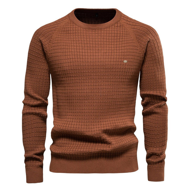 Versatile classic men's knit sweater, offering comfort and style for everyday winter fashion.