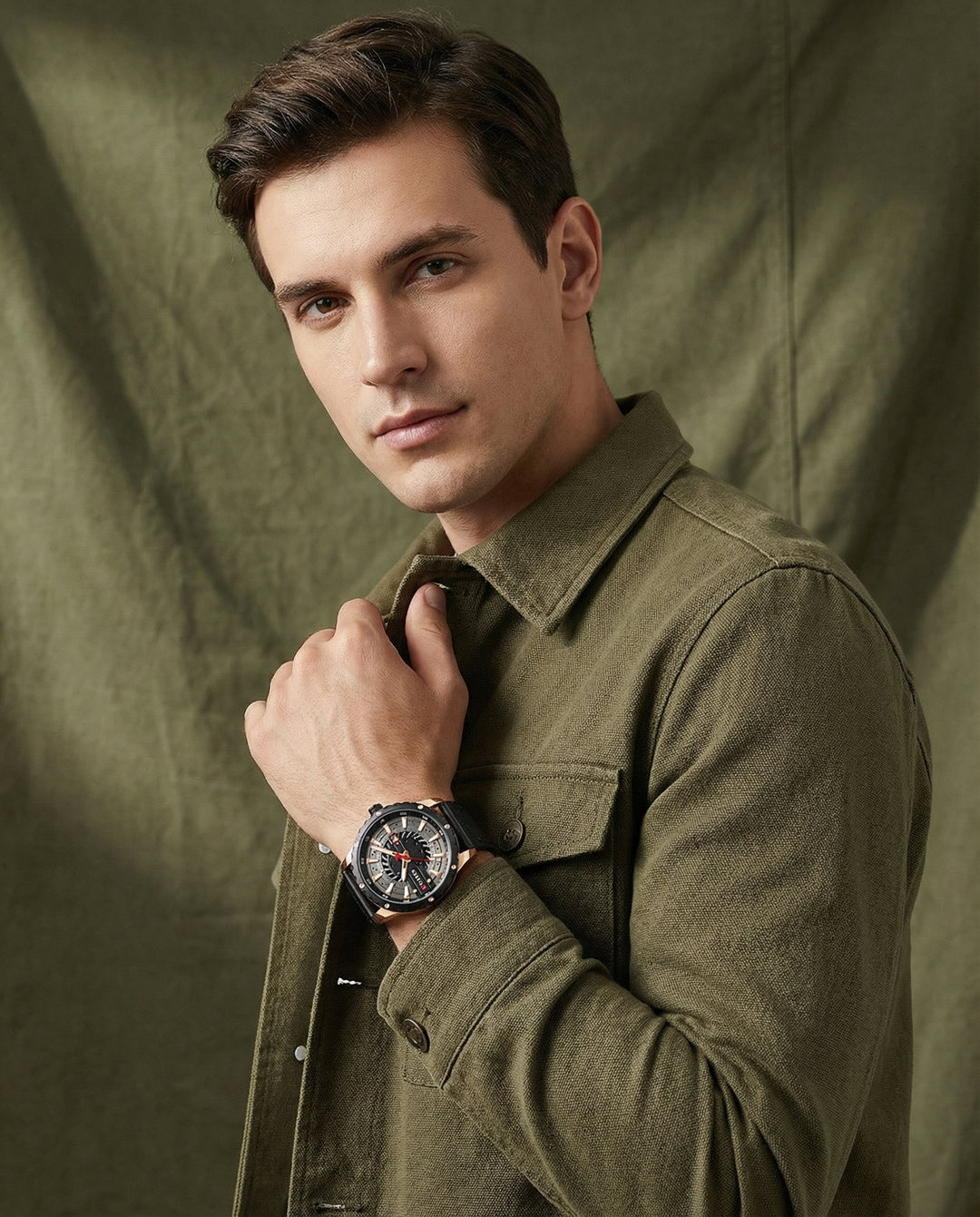 Close-up of a men's classic watch, showcasing a rich leather strap and detailed watch face.