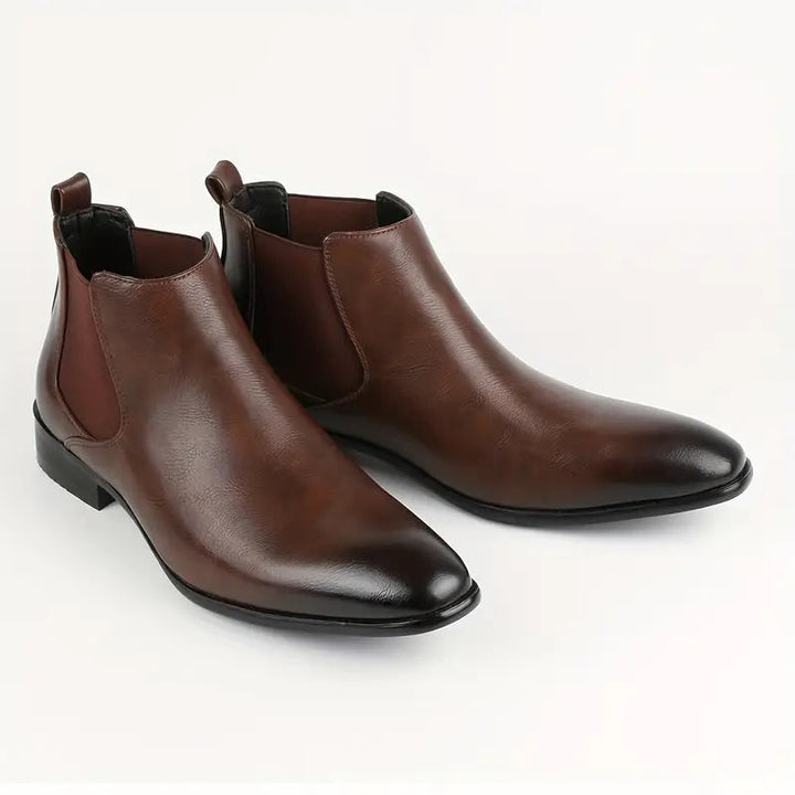 Detailed shot of the elastic gusset on men's leather Chelsea boots, ensuring easy wear