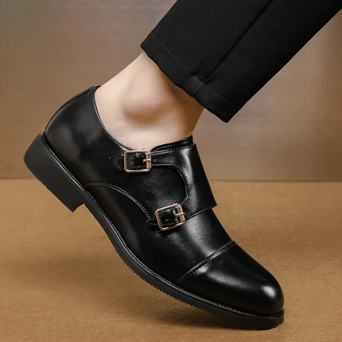 Overhead shot of men's double monk strap shoes, showcasing the elegant silhouette and fine leather craftsmanship