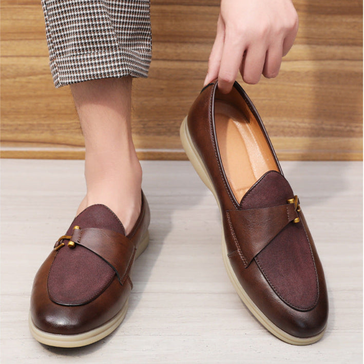 Pair of men's formal slip-on shoes, genuine leather loafers with a distinctive gold bit accent