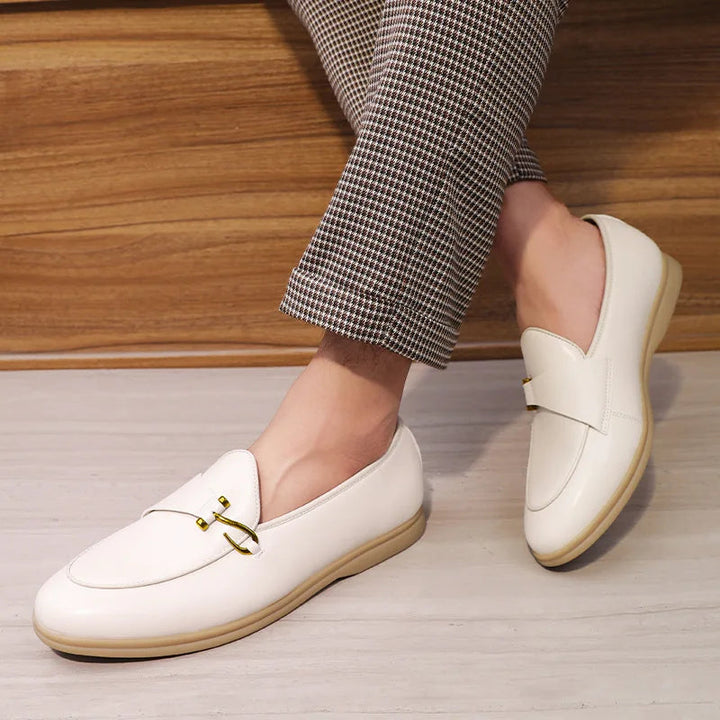 High-quality men's leather loafers, slip-on design with a prominent gold bit for a refined look