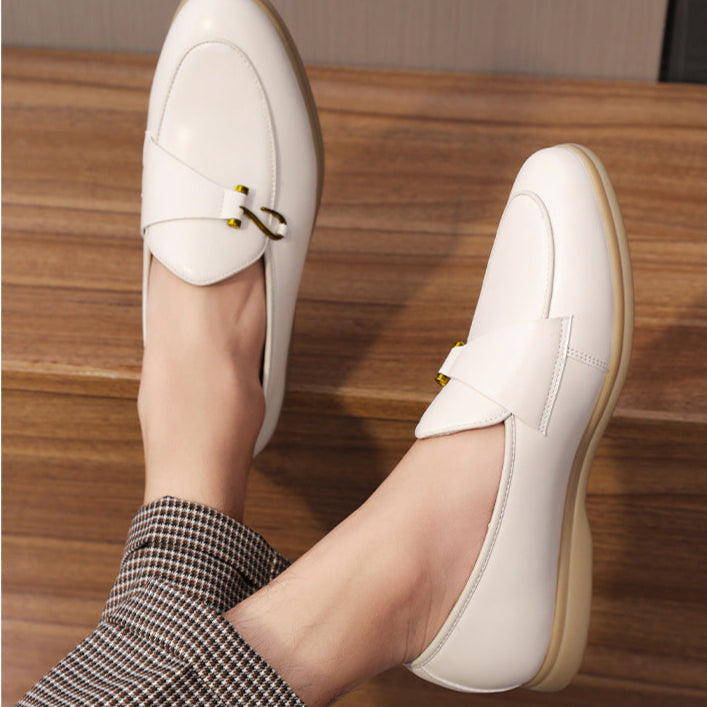 Comfortable men's dress shoes: black leather loafers with gold bit detail, suitable for business and events