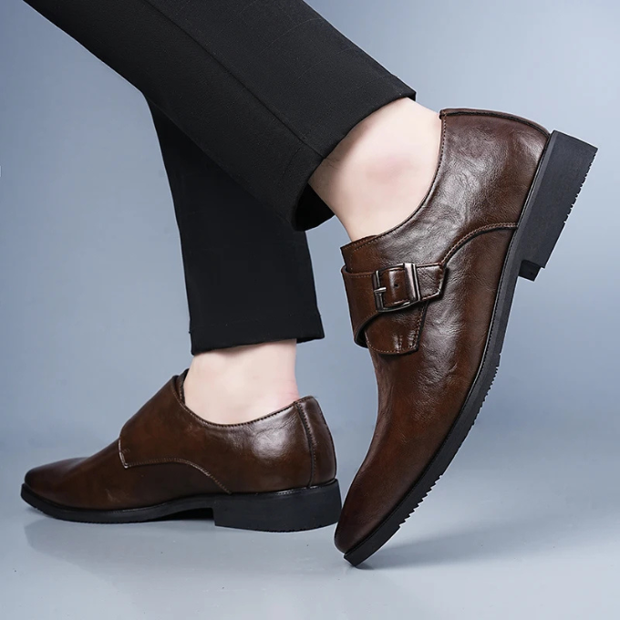 Pair of classic men's leather monk strap shoes in a timeless design, suitable for business and elegant formal events.
