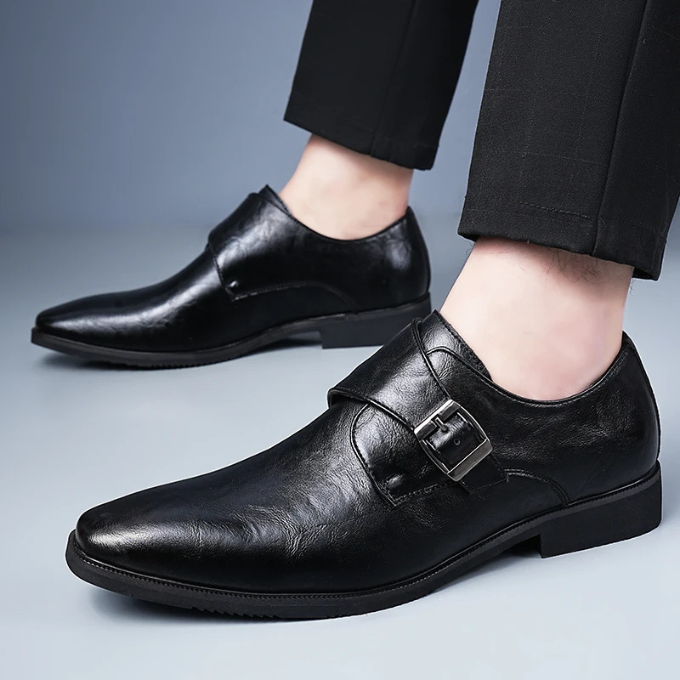 Men's formal leather monk strap shoes in a deep burgundy, offering a sophisticated touch to any gentleman's attire.
