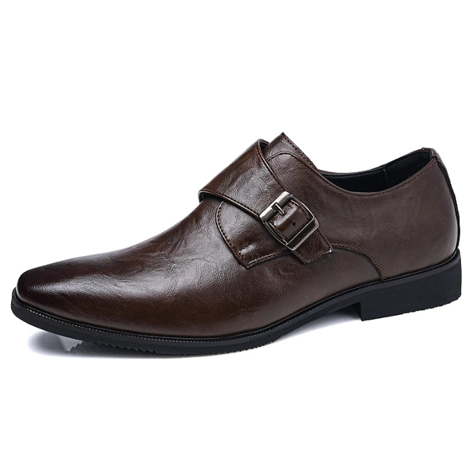 Men's leather monk strap shoes with a single buckle, a classic choice for formal and business dress. Elegant footwear.