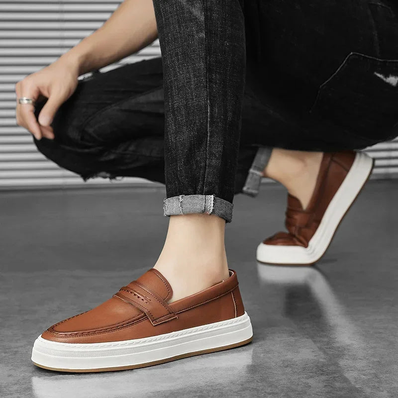 Close-up of the chunky sole on men's genuine leather penny loafers