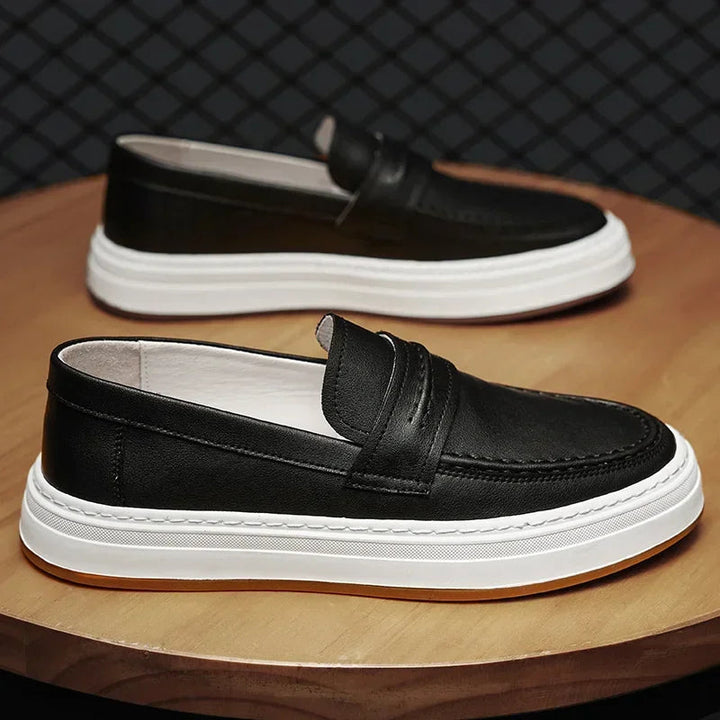 Men's leather loafers featuring traditional penny slot and chunky sole