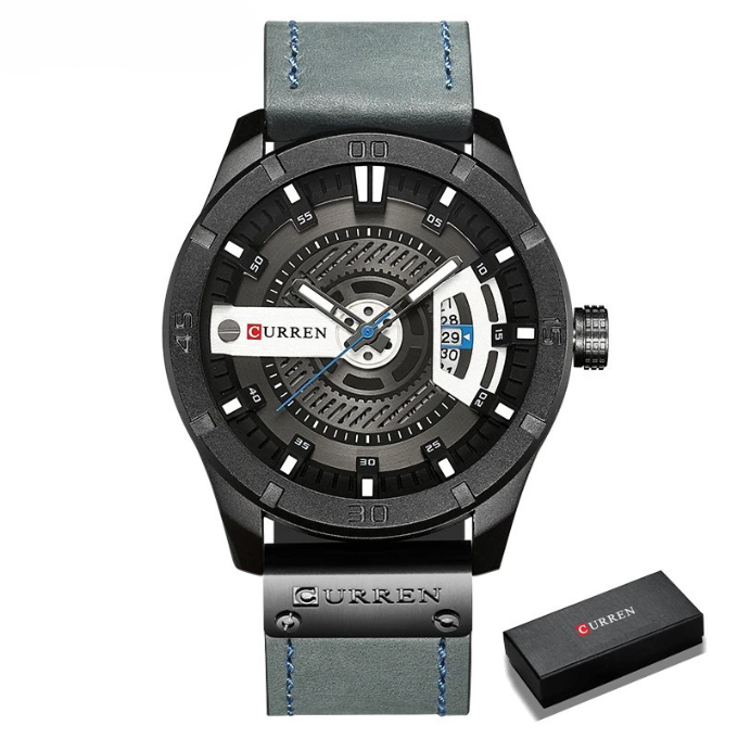 Detailed shot of men's watch face, classic numerals, date feature, leather strap