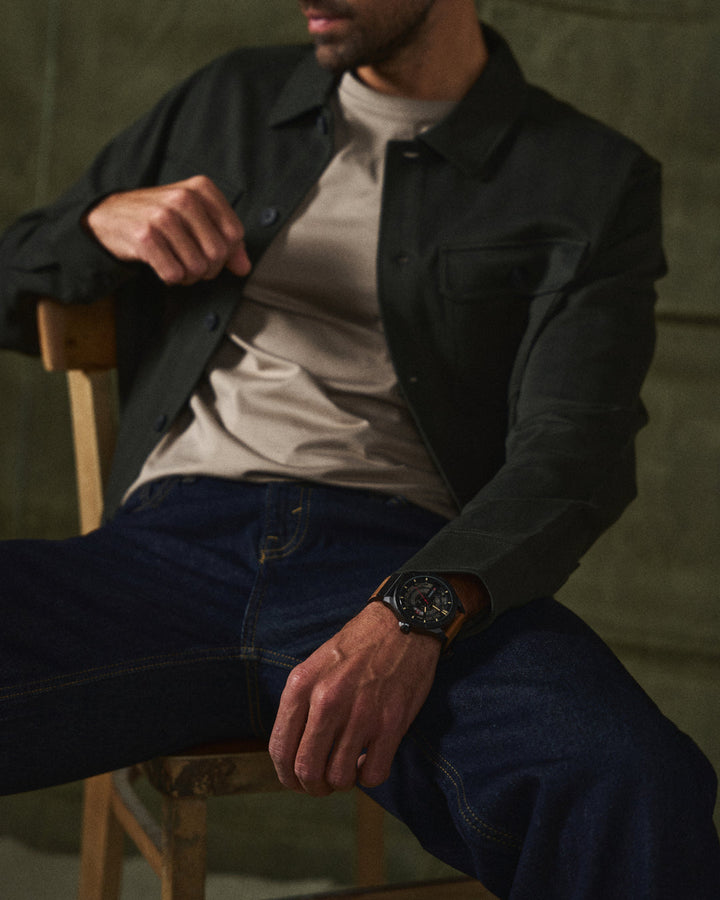 Classic men's timepiece, black leather strap, accurate quartz movement, water resistant