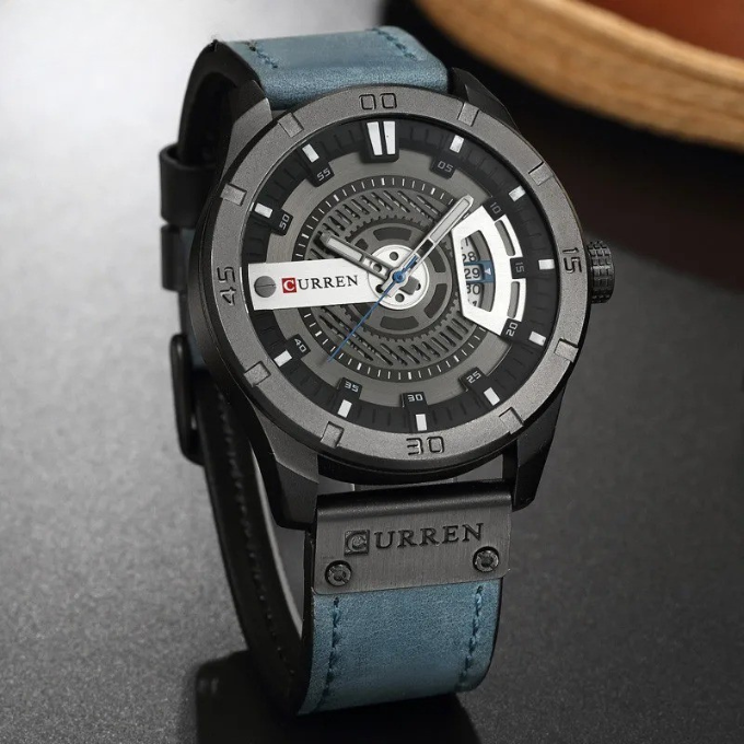 Gift for him: elegant men's leather watch with a round case and clear, easy-to-read face.