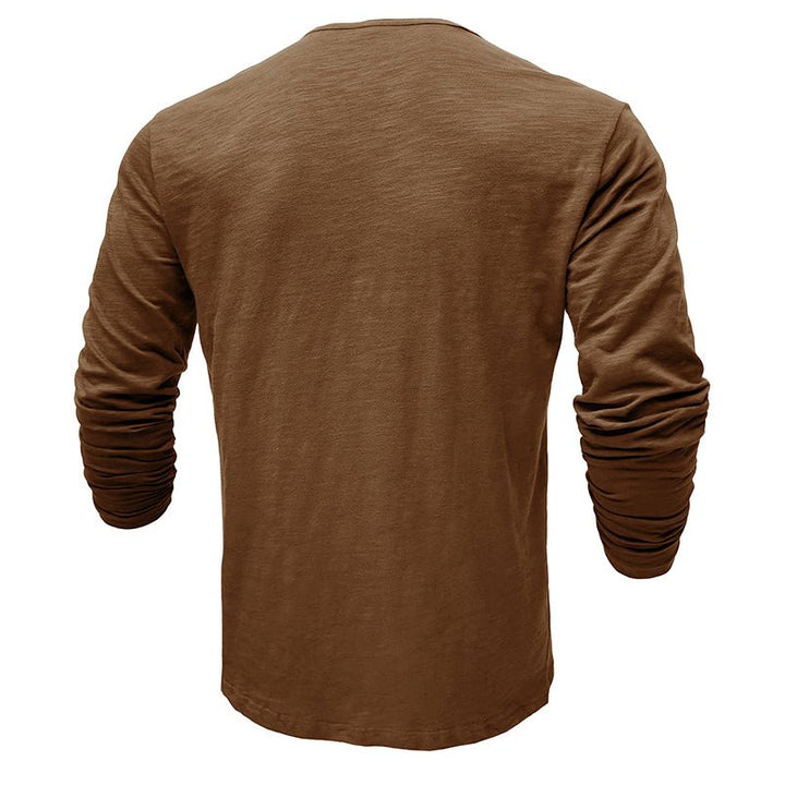 Classic long-sleeve henley shirt for men, in a deep forest green, perfect for comfortable wear