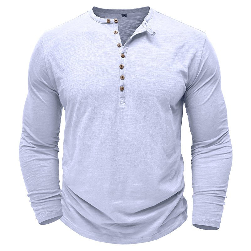 Man modeling a casual long-sleeve henley shirt, demonstrating its relaxed fit & stylish look