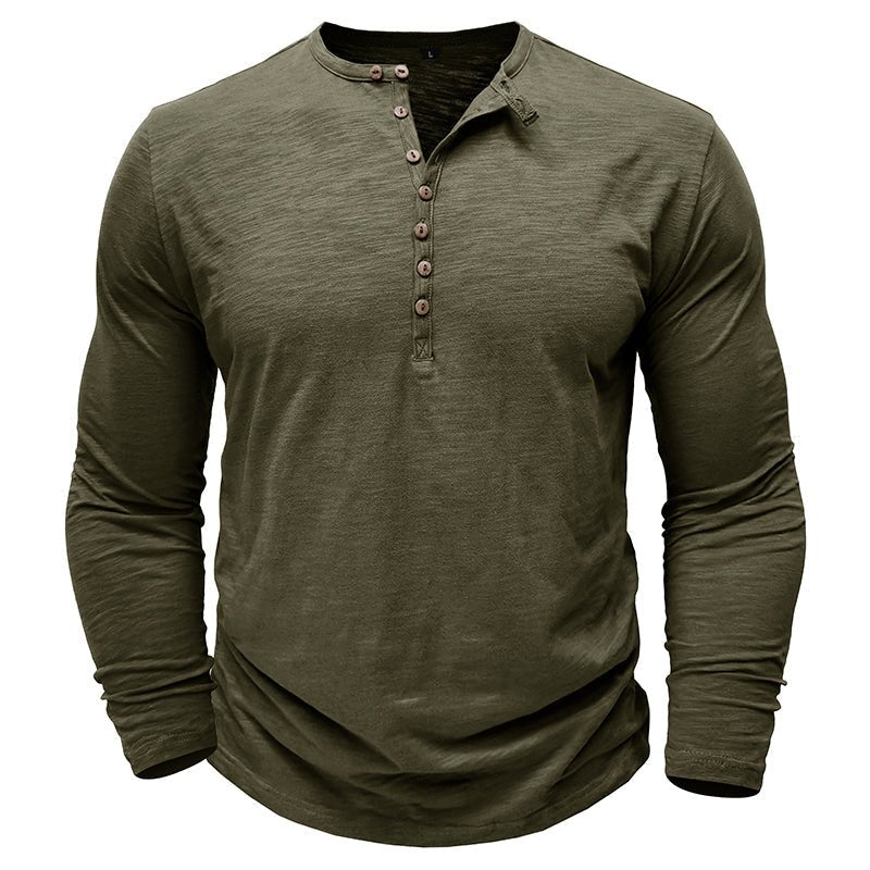 Close-up on the sleeve cuff of a men's classic long-sleeve henley, comfortable & well-made