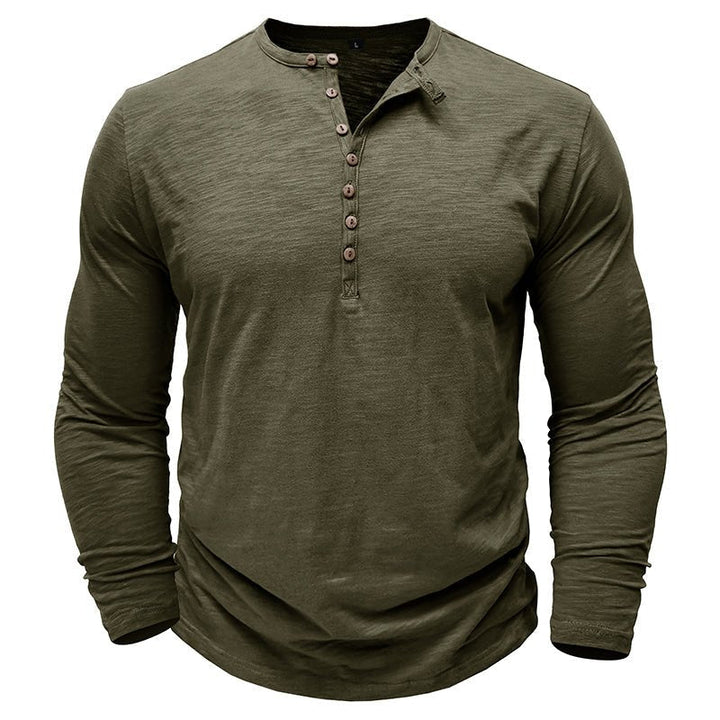 Detail of the stitching on a men's long-sleeve henley, indicating quality and comfortable wear