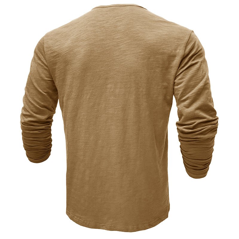 Detailed shot of the button placket on a men's long-sleeve henley shirt, adding to its casual appeal