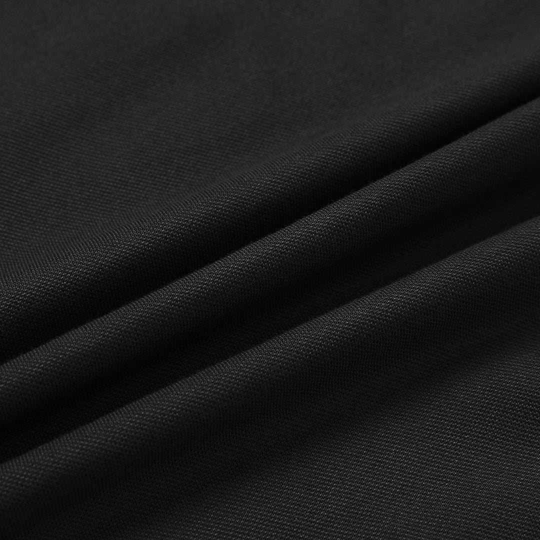 Close-up of the cuff on a men's long sleeve polo shirt, neat and durable for everyday wear.