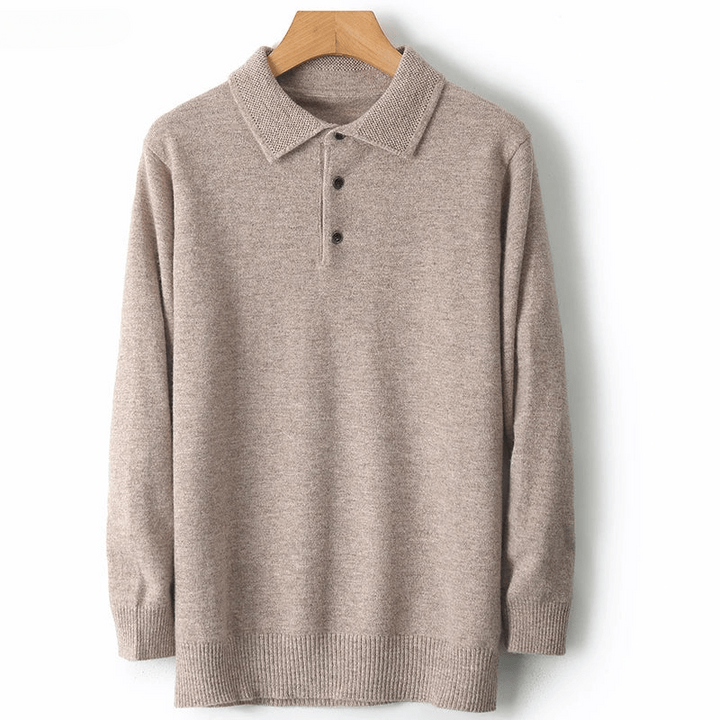 Detail of the button placket on a men's warm merino wool cardigan, highlighting quality craftsmanship.