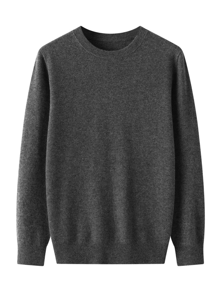 Close-up of a men's merino wool crew neck sweater showing the intricate knit pattern and soft texture.