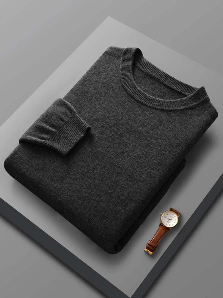 Classic men's black merino wool crew neck sweater, providing breathable warmth and timeless style.