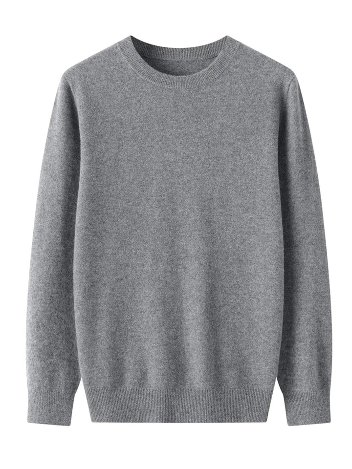 Relaxed fit men's merino wool crew neck sweater, perfect for layering during chilly winter months.