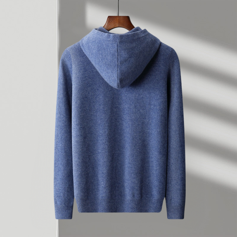 Man wearing a classic merino wool hoodie, standing casually. Showcases the fit & comfort for everyday wear.
