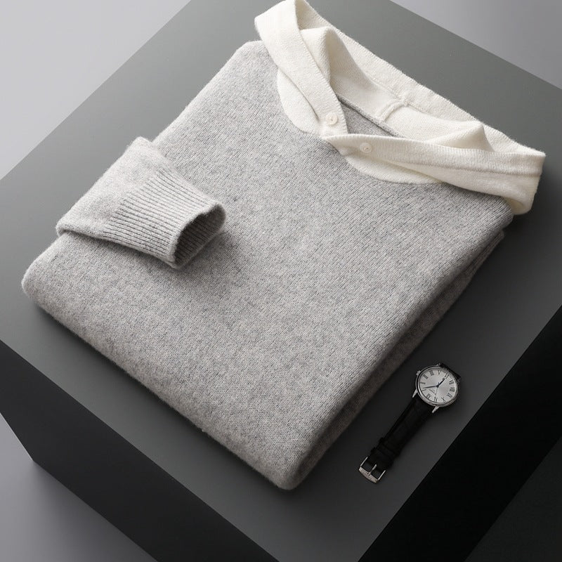 Side view of a man in a merino wool hooded sweatshirt, demonstrating the pullover style and hood profile.