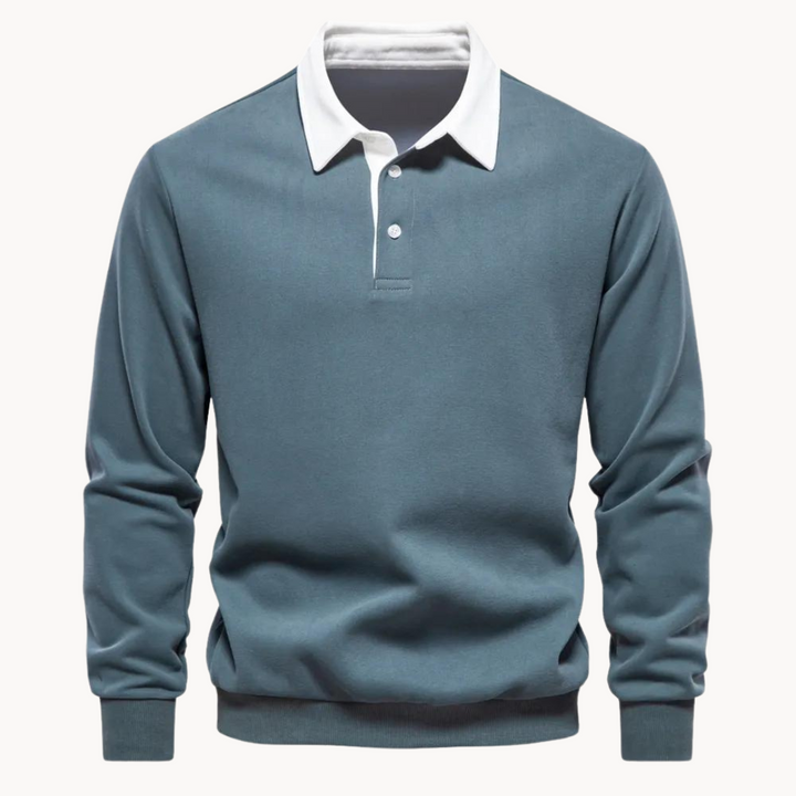 Close-up of men's heather grey fleece polo sweatshirt, highlighting soft fabric and button placket.