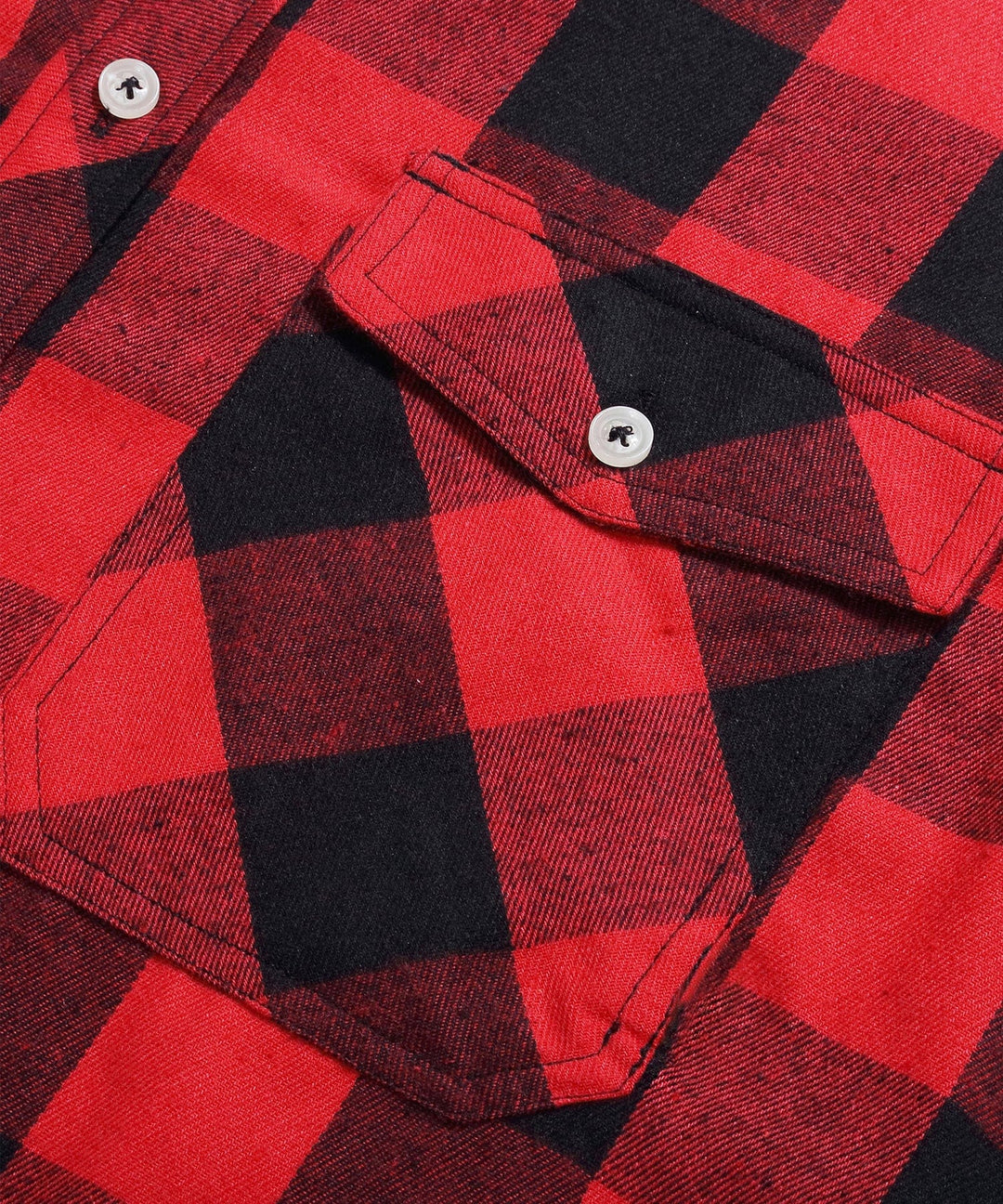 Detail of the sleeve and cuff of a men's plaid flannel shirt, long sleeve apparel