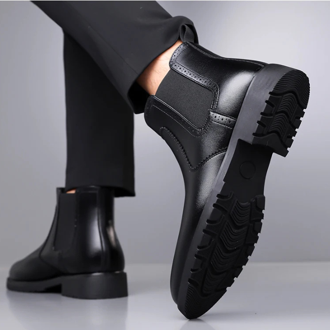 Versatile Men's polished black Chelsea boots, ideal for both formal tailoring and casual ensembles