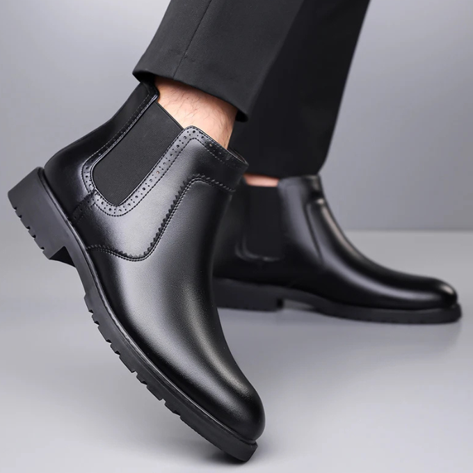 Men's fashion essential: polished black Chelsea boots providing a sleek and sophisticated look