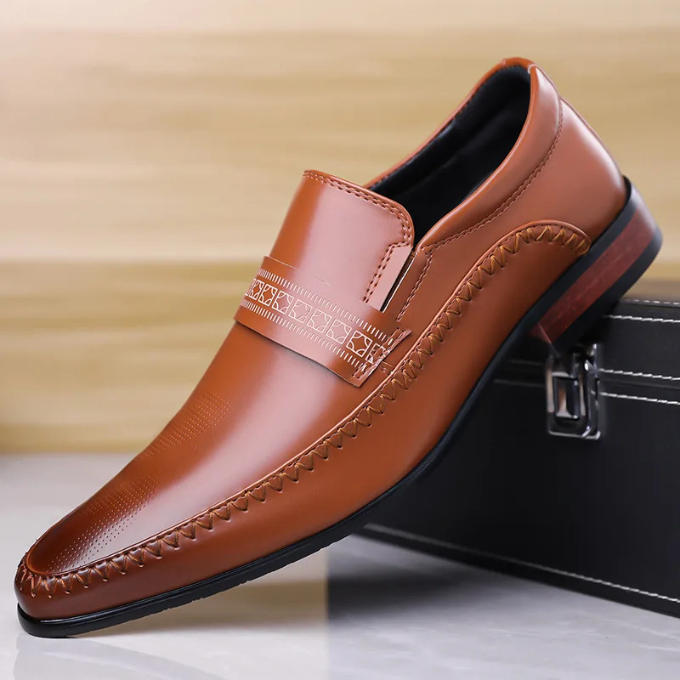 Close-up of the polished leather finish on men's classic oxford style dress shoes. Ideal business footwear.