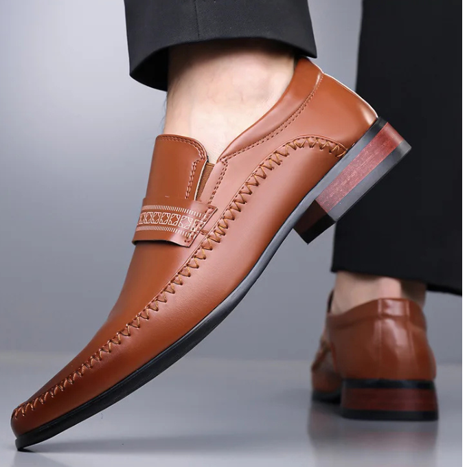Men's classic polished leather dress shoes, showcasing their timeless design and elegant formal footwear.