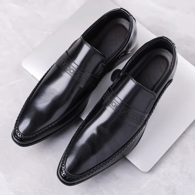 Top-down view of men's polished leather dress shoes, highlighting the quality and classic style.