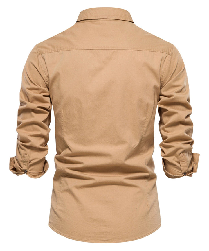 Detail of the collar and buttons on a men's classic short sleeve cotton blend shirt.