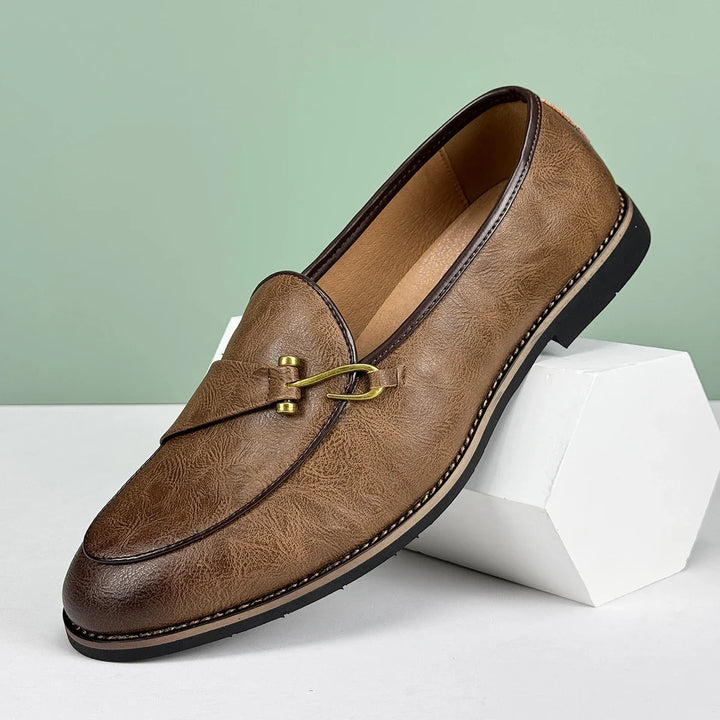 Versatile men's footwear: brown leather slip-on bit loafers for all occasions.