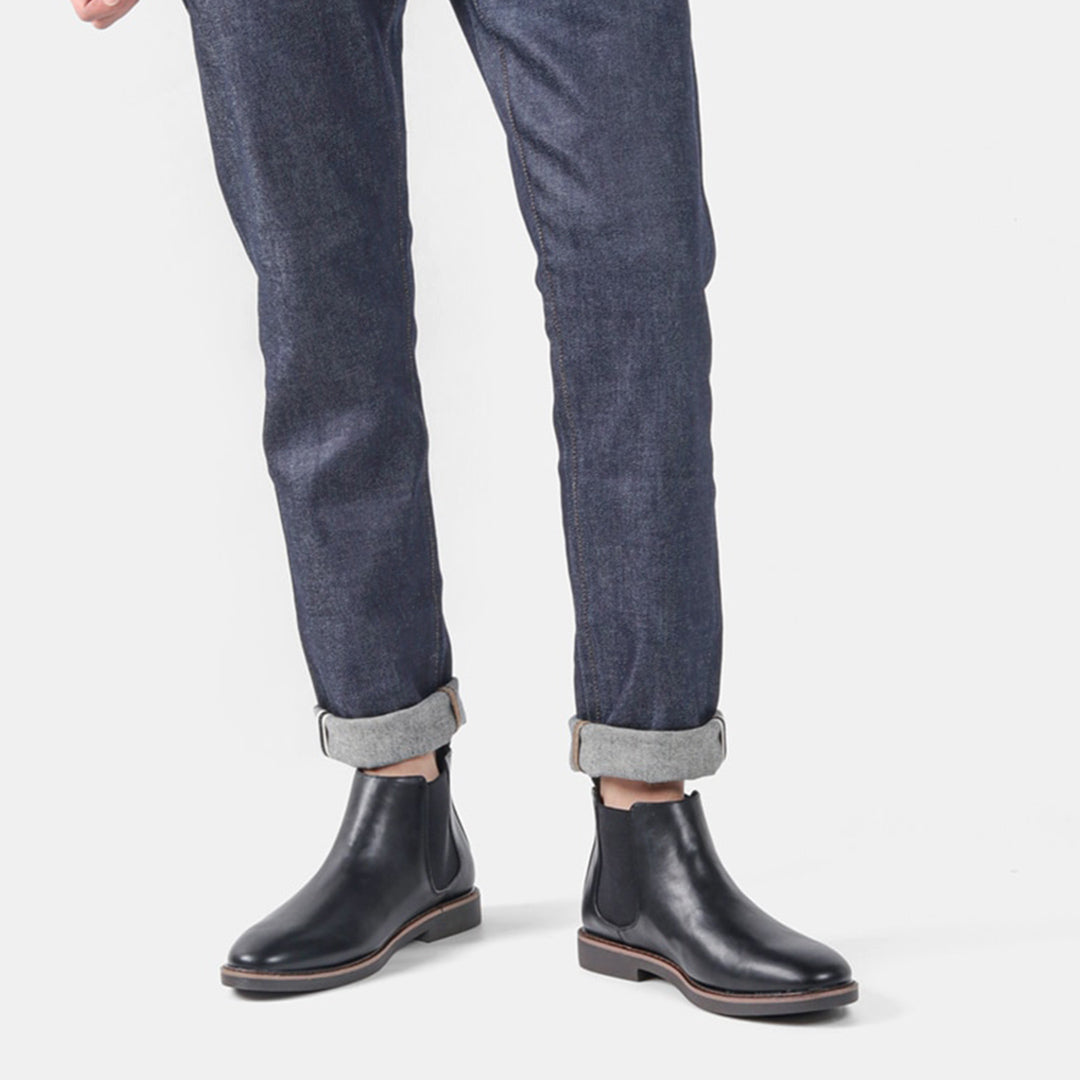 Men's Classic Slip-On Chelsea Boots lined up, showcasing various color options and timeless style