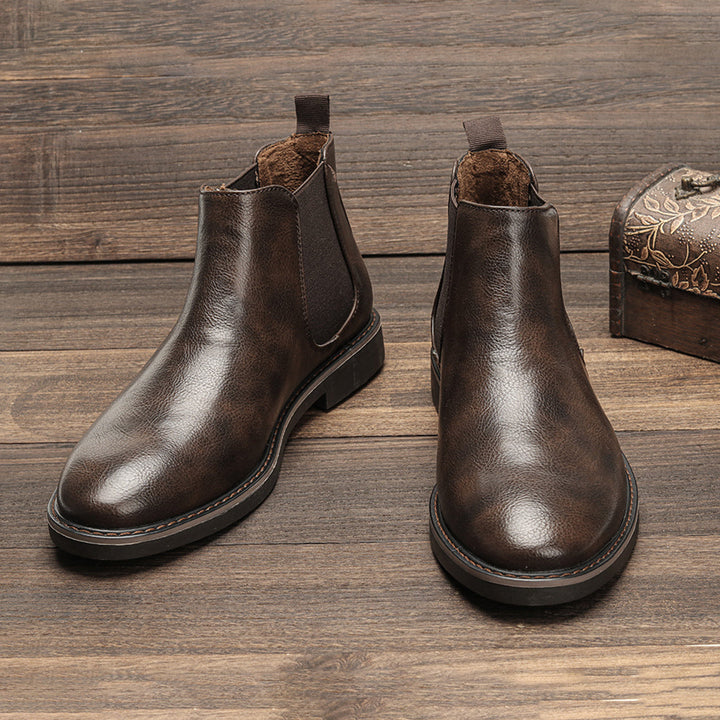 Pair of Men's Classic Slip-On Chelsea Boots in rich burgundy, showing smooth leather texture