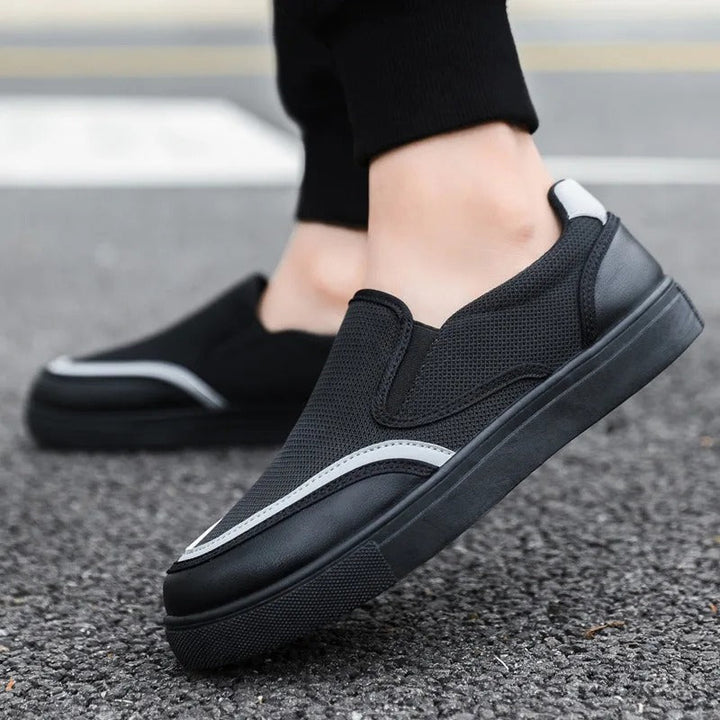 Front view of men's khaki slip-on loafers, showcasing the timeless design & quality.
