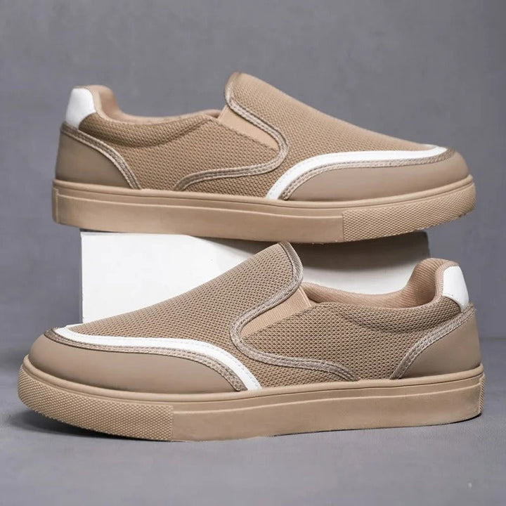 Pair of classic men's slip-on deck loafers, ready for everyday fashion & comfort.