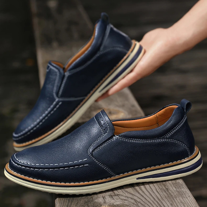 Side view of men's leather slip-on loafers, highlighting the low profile and comfortable design.