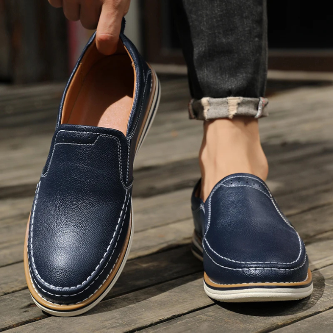 Detail of the leather texture on the men's classic slip-on loafers, showcasing quality.