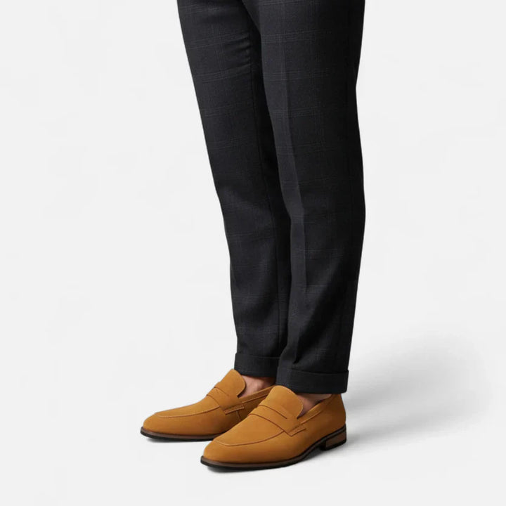 Versatile men's brown slip-on loafers, combining classic style and comfort for diverse casual & formal occasions.