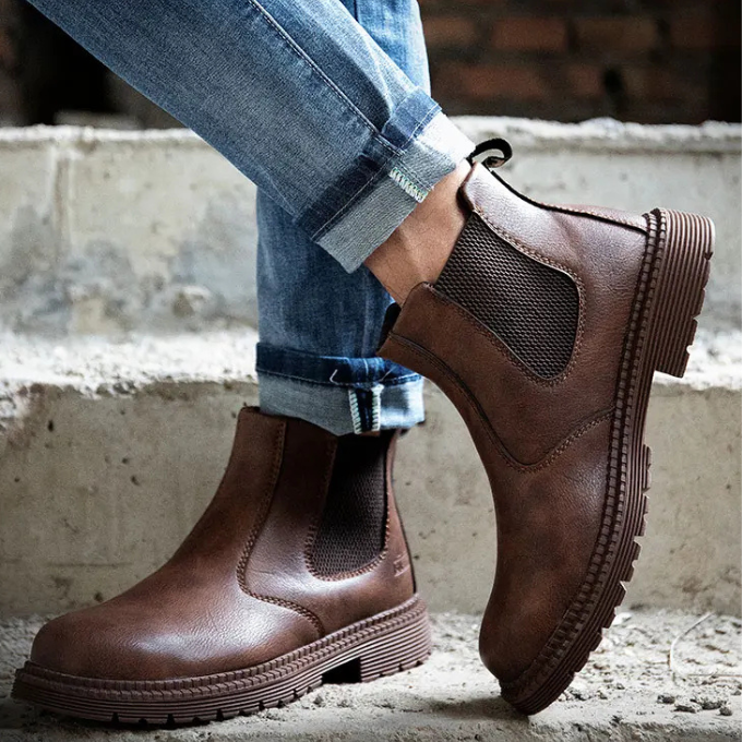 Close-up of the steel toe cap on men's Chelsea work boots, highlighting safety features