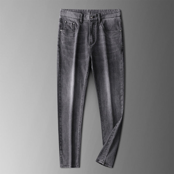 Full-length view of men's straight-fit stretch denim jeans, perfect for comfortable and stylish casual wear.