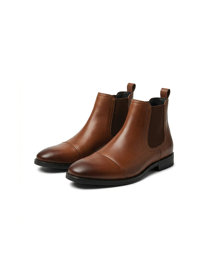 Men's classic tan leather Chelsea boots with elastic side panels, perfect for casual or dress wear.