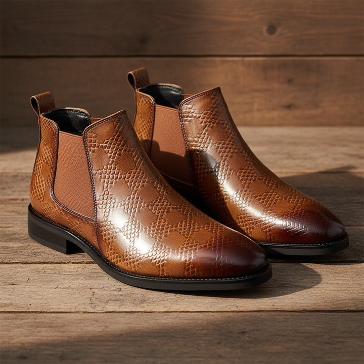 Stylish men's black leather Chelsea boots, ideal ankle boots for a sleek, versatile look.